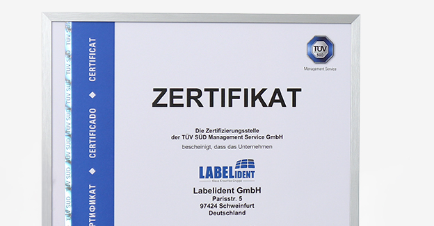 ISO 9001 Zertifikat von TÜV SÜD für Labelident GmbH als Nachweis eines geprüften Qualitätsmanagementsystems.